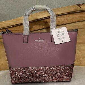 Kate Spade brand new 11 x 11 purse. Brand new with tags never used.